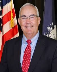 Executive Directors William Floyd and Duane Parrish, heads of the S.C.  Department of Employment and Workforce and S.C. Department of Parks,  Recreation, and Tourism, and members of the Coordinating Council for  Workforce