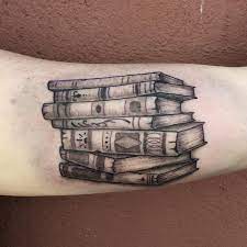 Maybe you would like to learn more about one of these? Stack Of Books Tattoo By Nic Lebrun Tattoonow