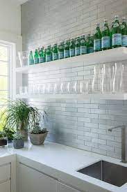 Check spelling or type a new query. Stirling Mills Interior Design Sleek White Wet Bar Boasts Stacked White Floating Shelve Floating Shelves Living Room Floating Bar Shelves Kitchen Sink Design