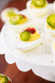 Spicy Deviled Eggs Are Made With Mayo Mustard Relish Sriracha Jalapeno And Bacon This Easy Recipe I Spicy Deviled Eggs Finger Foods Easy Yummy Appetizers
