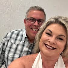 Boxer Bentley eating the rain outside