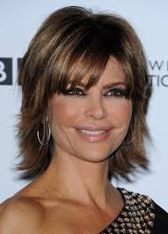 The hair is layered in order to give the hair more height and body, while the bangs have been left long in the front in order to give the style a little more edge. Short Layered Short Hairstyles Novocom Top