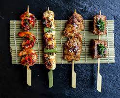 Delicious Japanese Skewers Also Known As Robatas From Left To Right Shrimp Robata Bathed In Oriental Bbq Sauce Octopus Ro Octopus Recipes Food Elegant Food