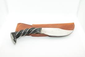 This simple yet stunning knife is hand forged with a twisted handle section and short blade. Railroad Spike Knife White Pass Yukon Route Railway