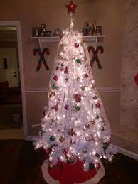 White and copper christmas tree decorating tips our house is quite literally a construction zone right now so i don't have a beautiful living room to put my tree in. Red Green Gold Christmas Decor On White Christmas Tree Gold Christmas Decorations Gold Christmas Christmas Bulbs