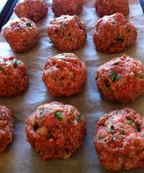 While meatballs are browning, in a separate, large deep pan add the olive oil, the tomato puree, spices and water, stir to combine. Jen S Incredible Baked Meatballs The Fountain Avenue Kitchen