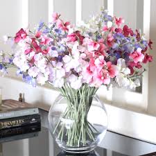 Sweet peas are a summer flower which are usually found with pink, lilac or purple colours which you will find here. Mixed Sweet Peas Bouquet Amaranthine Blooms Amaranthine Blooms Uk