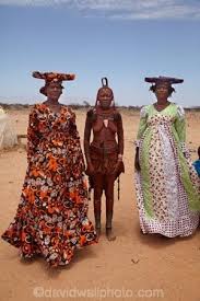 Namibia's german population is relatively small, but the group controls a large portion of the country's resources by farming land passed down by the first german settlers. Africa Two Herero Women Standing With A Himba Woman In The Middle Near Uis Namibia C David Wall Tribal Costume African African Women