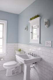 Subway Tile Wainscoting Puts Bathrooms On The Right Track Black And White Tiles Bathroom White Bathroom Tiles Bathroom Design Small