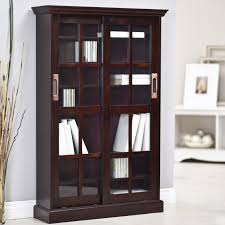 This sophisticated media rack features sliding tempered glass doors, for enhancing the look. Cherry Cherry Southern Enterprises Glass Window Pane Media Cabinet Bookcase Business Industrial Office