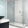 A custom glass shower surround installation can. 1