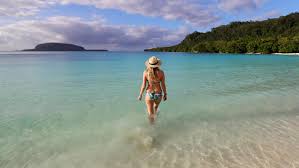 Red and green sections are divided horizontally by a gold stripe running within a. Five Gorgeous Vanuatu Islands You Didn T Know Existed Escape Com Au