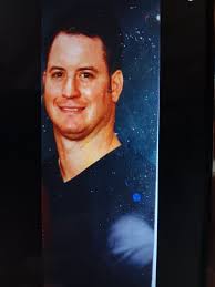 A salute to service: Navy Lt. Commander Eric McLaughlin is a member of  Concordia and currently serving in Washington D.C. Eric is pictured here  with his wife Yvon, and sons Jackson and