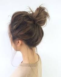 Take an elastic and pop it over the divided sections. Pin On Hair Beauty Tips