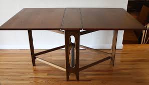 Perhaps you need a stool to sit down on every once in a while, or and these folding kitchen stools will easily slip between your fridge and the wall for storage. Danish Mid Century Modern Gateleg Dining Table Picked Vintage