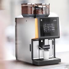 It automatically grinds the beans on your behalf thanks to the integrated burr grinder, so your cup flavour delivery is pretty unrivalled. Coffee Machines Office Pantry