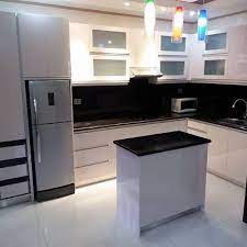 Angela Kitchen Cabinet This Kitchen Is A Piano Finish L Type With An Island A Kitchen Island Is A Countertop I Modular Kitchen Cabinets Kitchen Kitchen Space