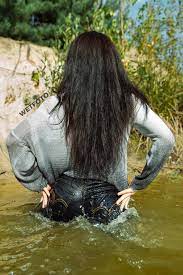 Levi's womens original overall jeans. Brunette Girl In Wet And Dirty Levis Jeans Has Fun By The Lake Wetfoto Com