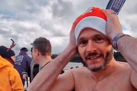 UUP MLA Robbie Butler makes festive splash for mental health charity