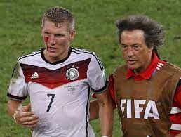 Schweinsteiger being harried off the pitch following a cut just beneath his eye Photo Bastian Schweinsteiger Left Bleeding After Knock From Sergio Aguero Thescore Com