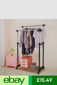 Check spelling or type a new query. Metal Garment Rack Stand Heavy Duty Double Clothes Hanging Rail On Wheels Garment Racks Clothes Rail Hanging Clothes Rail