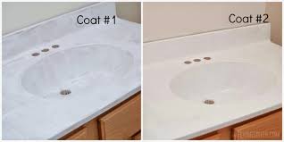 The painted marble surfaces blend so seamlessly with all of the other new elements and really brought down the total cost of this renovation. Remodelaholic Painted Bathroom Sink And Countertop Makeover