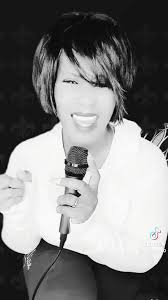 Wow! A Whitney Houston look-a-like.
