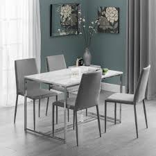 Unsurprisingly, its color, shape plus size play very important roles. White Marble Dining Table With 4 Grey Dining Chairs Julian Bowen Scala Furniture123