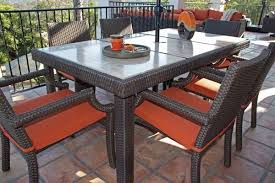 Sunset Wicker 6 Person Dining Table Comes With A Stone Top Cushioned Dining Chairs With A Wide Comfo Outdoor Dining Set Patio Dining Set Dining Chair Cushions