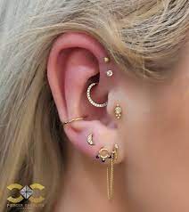 Piercer Charlie S Creations On Instagram Here At Piercer Charlie S Creations We Are Dedicated Exclu Cool Ear Piercings Earings Piercings Cute Ear Piercings
