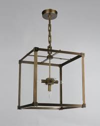 Shown In Medium Antique Brass Remains Lighting Co With Images Lantern Pendant Lighting Stairway Lighting Unique Lamps