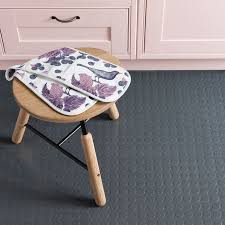 Rubber flooring is a specialty flooring option designed to add padding and spring underfoot. Dark Grey Studded Rubber Flooring Tiles 49 95 Per Square Metre
