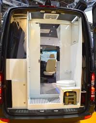The Sprinter S Rear Houses A Bathroom With Integrated Wardrobe Closet Mercedes Sprinter Camper Mercedes Van Camper Conversion