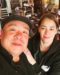 Vandolph Quizon, a Filipino actor, comedian, and politician. He is shown  with a woman who appears to be his wife, Jenn Quizon (also known as Jenny  Salimao). Details: Vandolph Quizon: His social