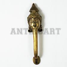 Iron with brass front, 9 long from the hanging ring at the top to the hook at the bottom. Vintage Brass Door Pull Handle Budha Head Antikcart