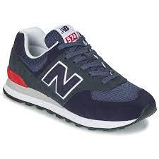 Blue and red leather low top 574 classic sneakers from new balance featuring a round toe, a lace fastening, contrasting panels, front and side logo branding, a ridged rubber sole and a branded insole. New Balance 574 Shoes Stone Blue Outerspace Ml574eae Footy Com
