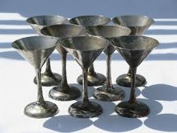 For classic drinks, keep martini glasses on hand, as well as shakers and stirrers. 8 Art Deco Vintage Martini Cocktail Glasses Silver Plate Over Brass