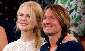 Keith urban was born on october 26, 1967 in whangarei, north island, new zealand as keith lionel urban. Nicole Kidman And Keith Urban Cuddle At Australian Open