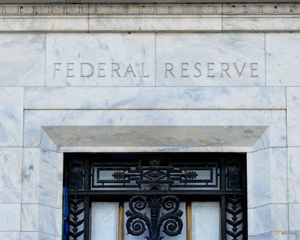 Fed rate hike rumors grow as inflation concerns rise; policymakers dissent over steady rates amid pressures from Trump's Iran war