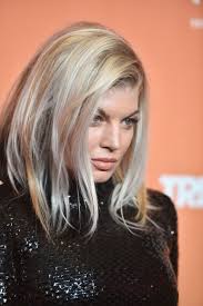 To get a smart and edgy look even at the age over 50, the straight and chopped hair at medium length is a nice option. Fergie S Sexy Lob Medium Length Haircuts For Women Over 40 Stylebistro