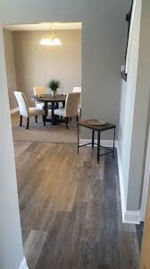 This waterproof flooring is created to hold up in areas that have a high risk of getting wet such as basements, kitchen areas, or bathrooms. Coretec Alabaster Oak Flooring House Flooring Oak Floors Luxury Vinyl Plank Flooring
