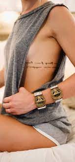 30 Feminine Rib Tattoo Ideas For Women That Are Very Inspirational Rib Tattoo Rib Tattoos For Women Rib Tattoo Quotes