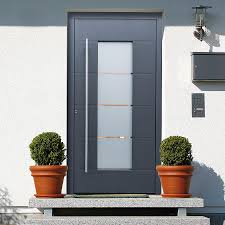 Pixcity idées déco pour une porte d'entrée méditerranéenne avec un sol en carreau de terre cuite, une porte double, une porte en bois brun et un sol rouge. Porte Exterieure D Entree De Maison Officielle Securite