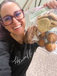 Pastor Herb, Regina and Sara handing out candy.