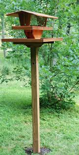 These 4x4 post bird feeder pole baffles make bird pole post hanger arms is a pair of 12 inch bird feeder angled hanger arms. Hurley Byrd How Installing A Large Pole Mounted Bird Feeder