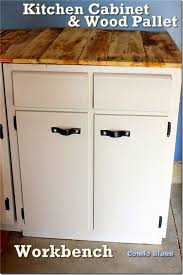 Recycled Kitchen Cabinet And Wood Pallet Workbench Recycled Kitchen Wood Pallets Workbench