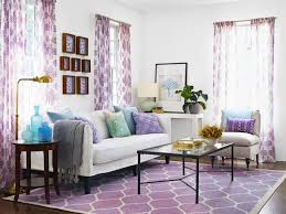 The vibrant purple shade goes perfectly with the minimalist setting of this sleek living room. Purple Decorating Ideas Living Rooms Natilittlethings