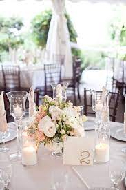 Classic White Wedding With Diy Details Wedding Centerpieces Wedding Floral Centerpieces Wedding Table