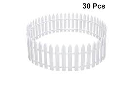 It is not merely a means of tracing a property line or a frame upon which rambling roses may grow. 30pcs Picket Fence Garden Fencing Lawn Edging Home Yard Christmas Tree Fence Kogan Com