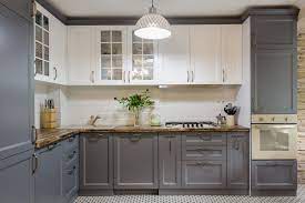 But all three of the houses that we've owned, all came with dark cherry kitchen cabinets. How To Paint Kitchen Cabinets Without Sanding This Old House